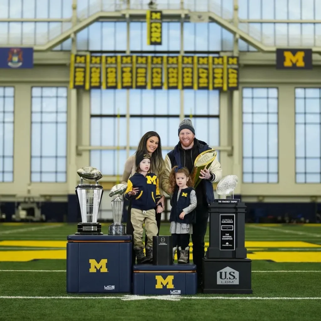 Brhitney Harbaugh with Husband Jay Harbaugh and two children together.